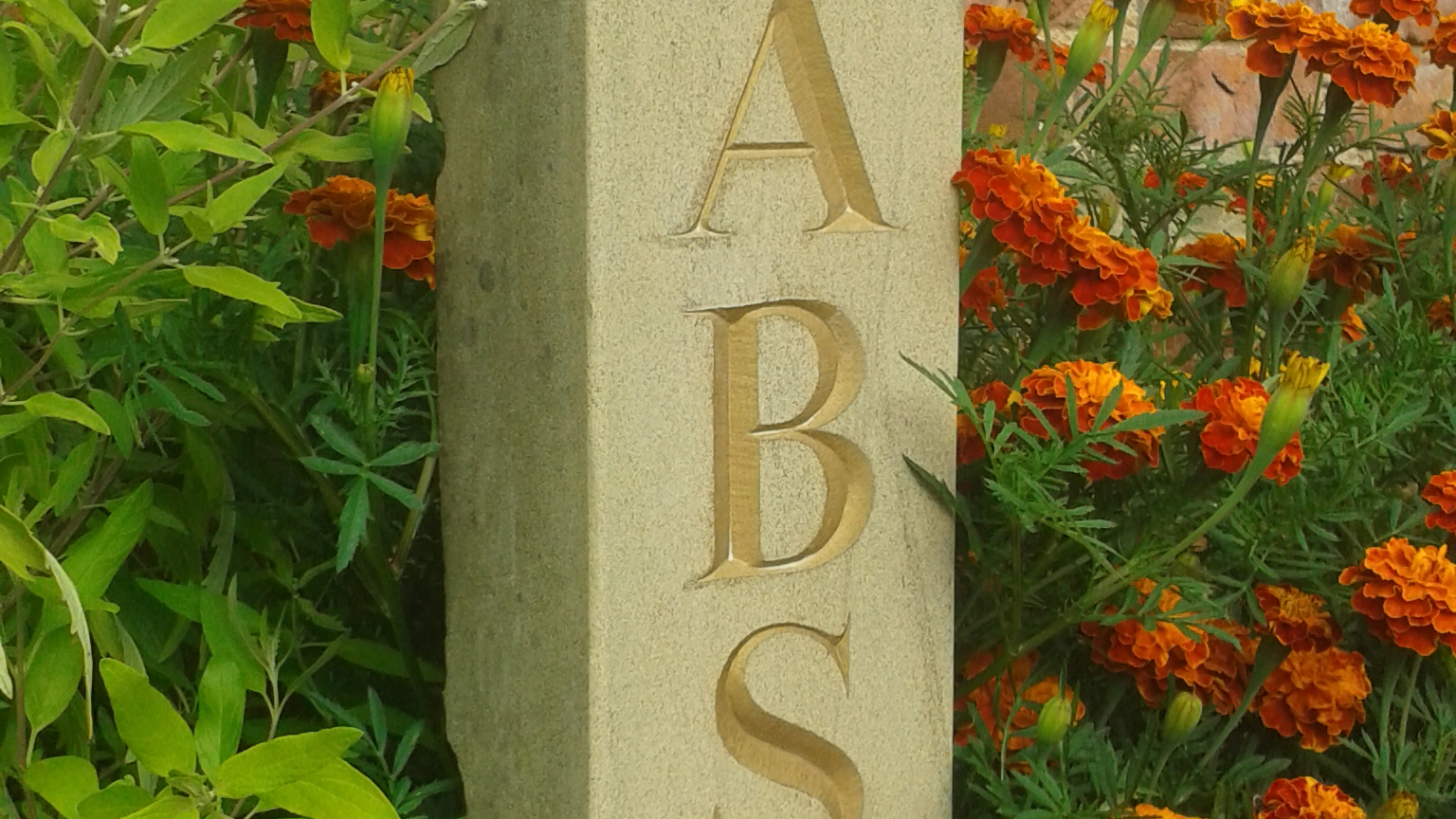 hand-carved memorial stones and plaques