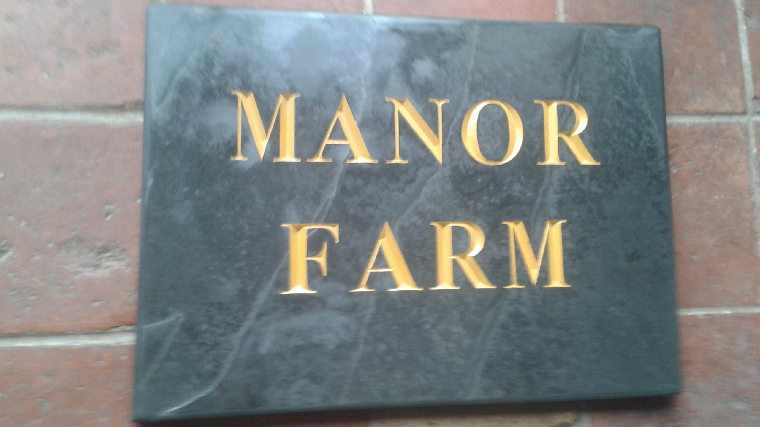 hand-carved stone lettering and signage