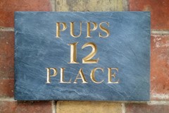 image: hand-carved stone lettering and signage (sample 1)